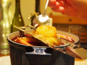 Feuerzangenbowle -Pouring rum over the sugar