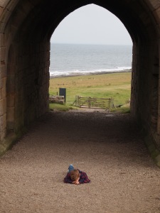 Jude having a fit at the entrance to the Dunstanburgh castle. LOL